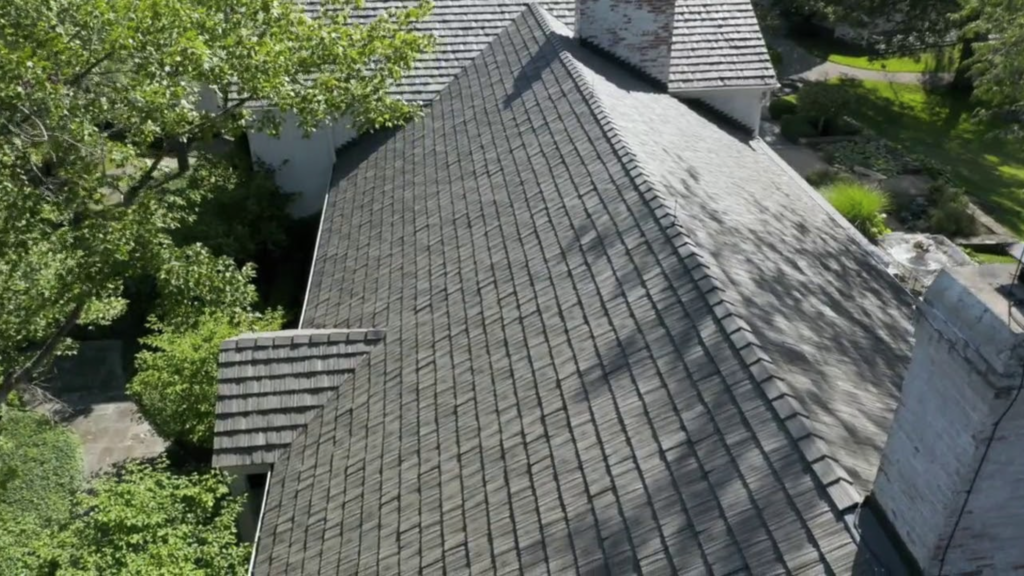 Close-up of Class 4 impact-resistant shingles, showcasing durable, weather-resistant roofing designed to withstand hail, wind, and debris.